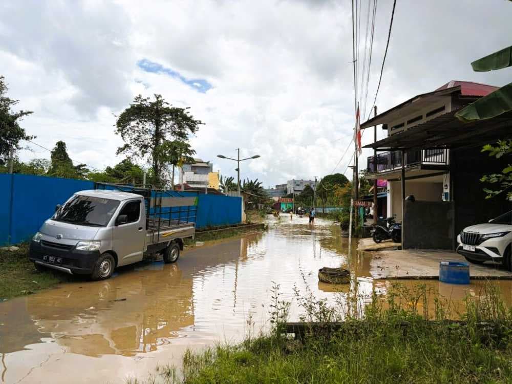 Banjir kembali merendam RT 11 Rawa Indah, Sangatta Utara, setelah hujan deras dan debit sungai meningkat. Warga waspada potensi banjir susulan. (Foto: Prokutim)